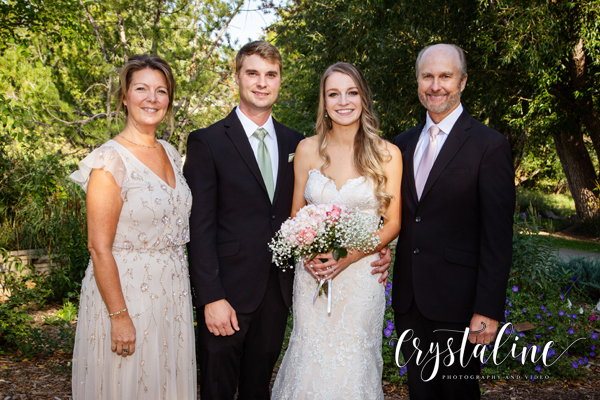 Bride and groom with parents